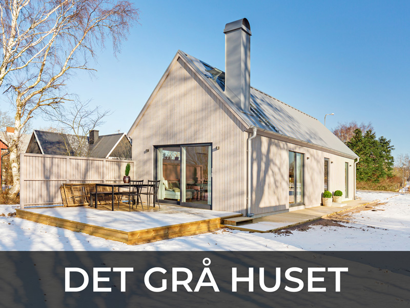 Bild av projekt "Det grå huset". Leder in till sida med reportage om det grå huset.